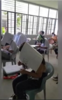 Students in Philippines wear bizarre ‘anti-cheating’ hats in class